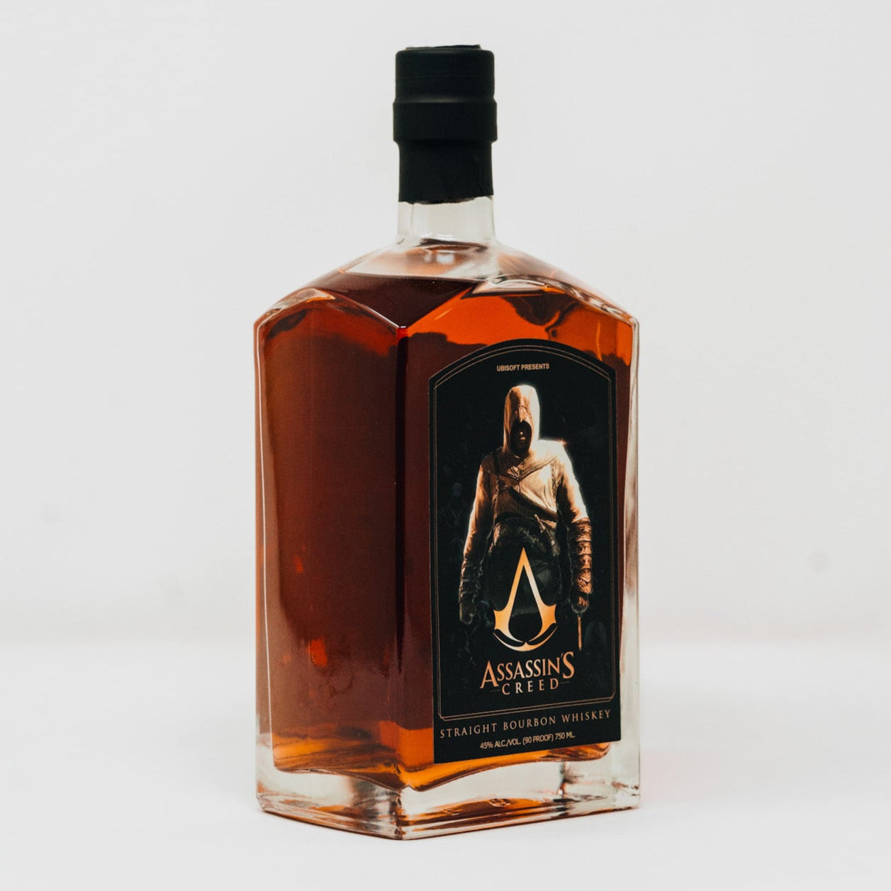 Assassin's Creed Straight Bourbon Whiskey bottle with a label on a white background